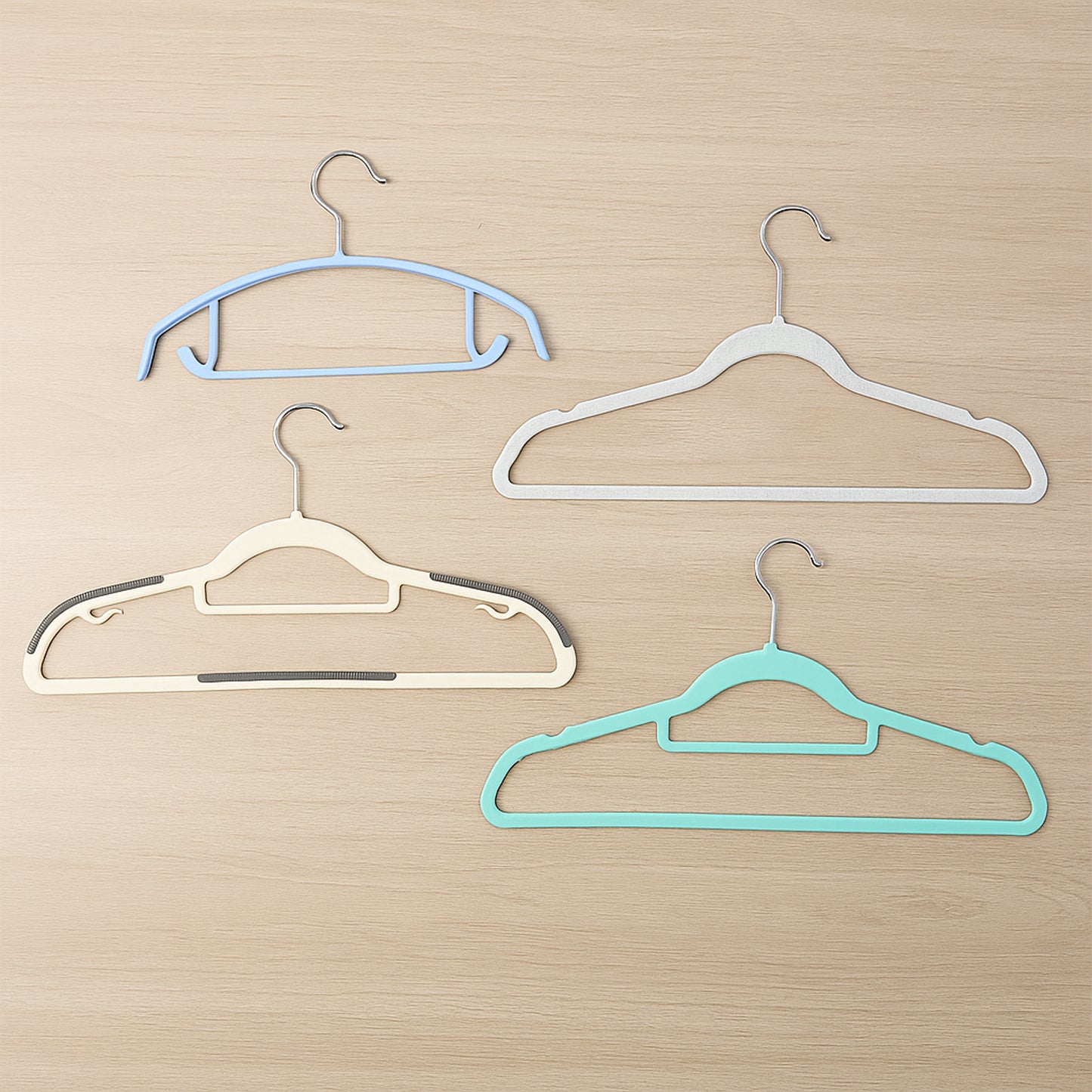 Wukusy premium mix design non-slip clothes hanger showing multiple colorful hangers with textured non-slip surface for clothing.