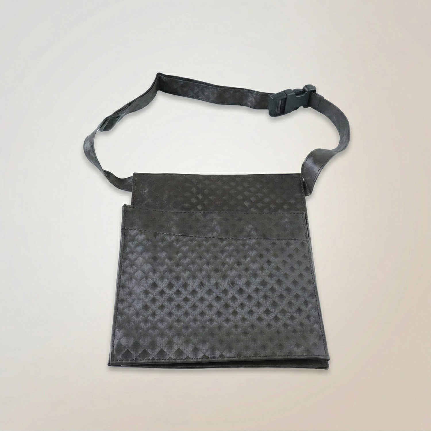 Wukusy quilted crossbody sling bag for men and women with adjustable strap, stylish and compact for everyday use.