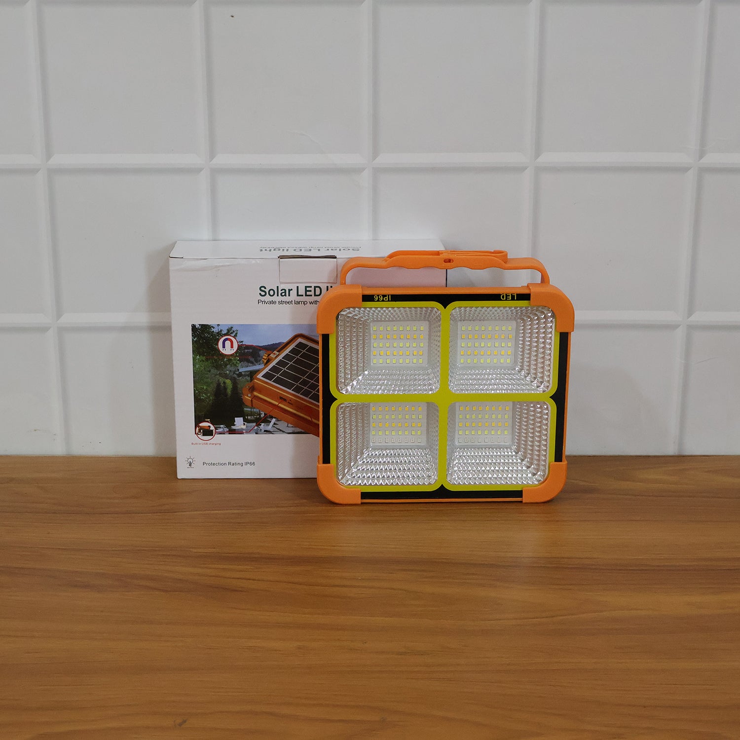 Wukusy high power solar LED flood light with 12000mAh battery, outdoor waterproof lighting for security and illumination.