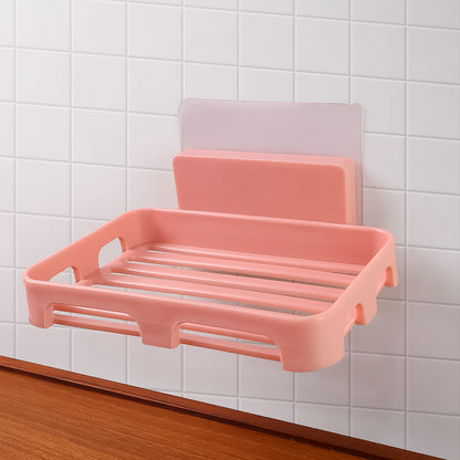 Wukusy self-adhesive rectangular soap dish holder mounted on bathroom wall, made of durable plastic with drainage slots
