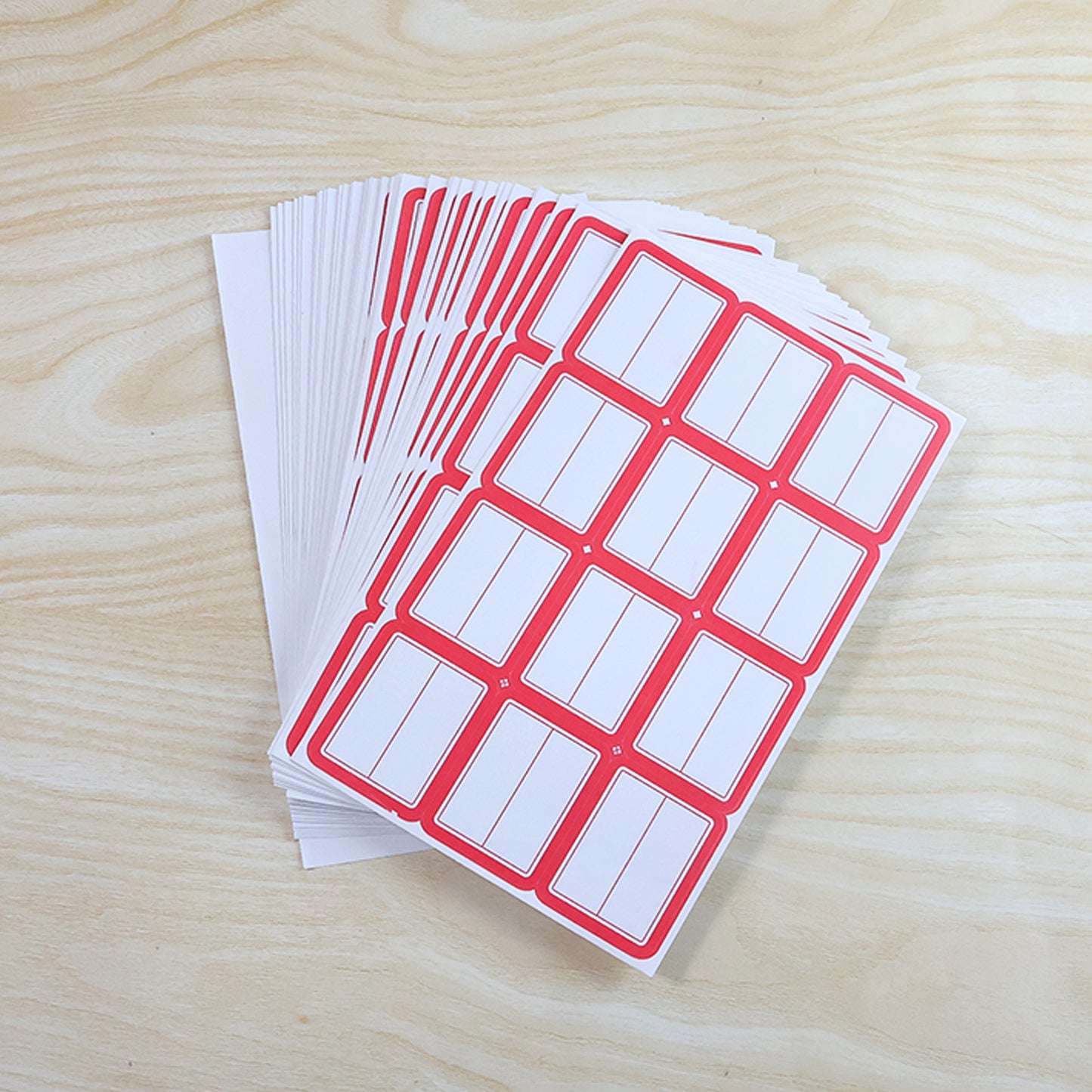 Writable label stickers from Wukusy, 50 sheets, showing colorful adhesive labels ready for writing and organization.