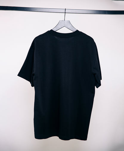 Black Valentino printed men's T-shirt, size M, with graphic design, displayed on a plain background.