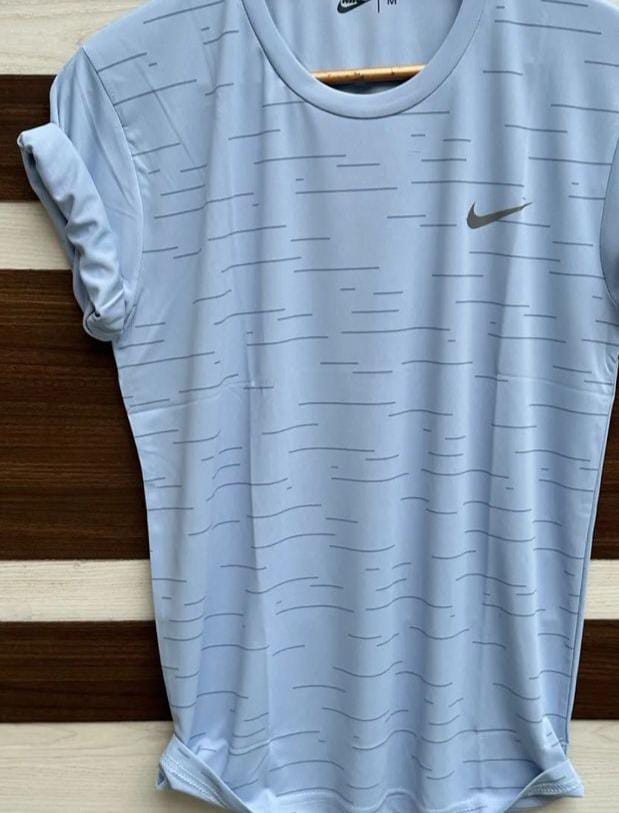 Men's Nike trending grey T-shirt, size small, casual fit, soft cotton fabric, front view, stylish and comfortable for everyday wear.