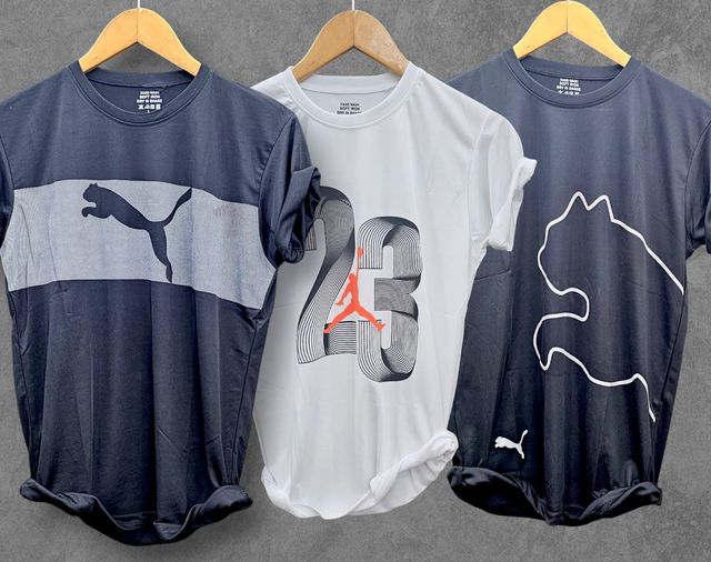 Set of three men's multicolor T-shirts from brand 8969, casual crew neck style, comfortable everyday wear.