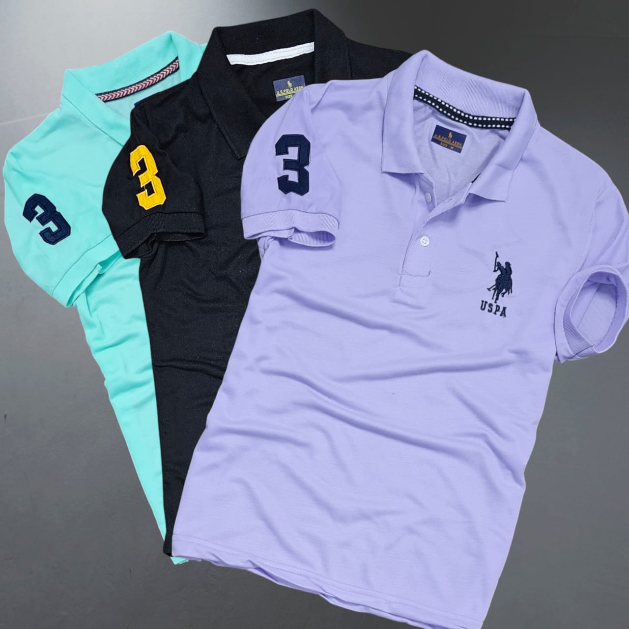Set of three multicolor men's polo neck T-shirts by 8969, casual short-sleeve shirts in different colors, size M.