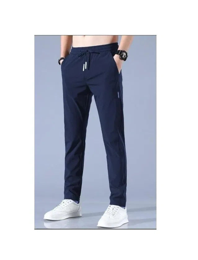 Men's Lycra track pants by 8969 in multicolor, showcasing comfortable fit and sporty design.