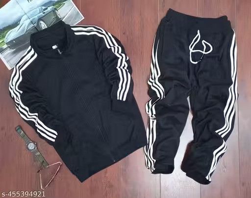 Black Adidas men's tracksuit made of lycra, featuring a zip-up jacket and matching pants with sporty design.