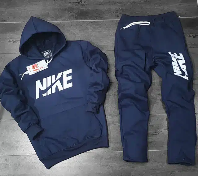 Men's navy blue fleece hooded tracksuit by 8969, featuring a comfortable fit and casual style, shown on a male model.