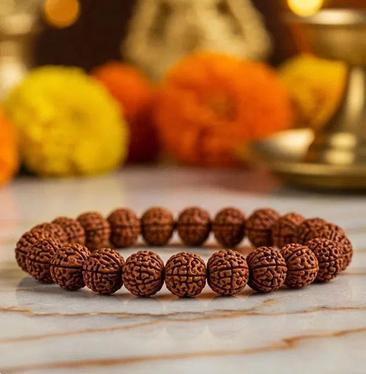 7 Mukhi Rudraksha bracelet from 8995 Pooja Articles, featuring a string of sacred Rudraksha beads for spiritual wear and meditation.