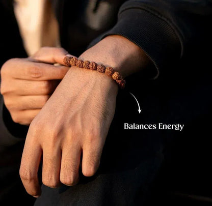 7 Mukhi Rudraksha bracelet from 8995 Pooja Articles, featuring natural beads on a string for spiritual and meditation use.