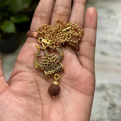 Spiritual Shiva Trishul and Damaru necklace, pooja article from 8995, featuring traditional religious symbols for spiritual practices.