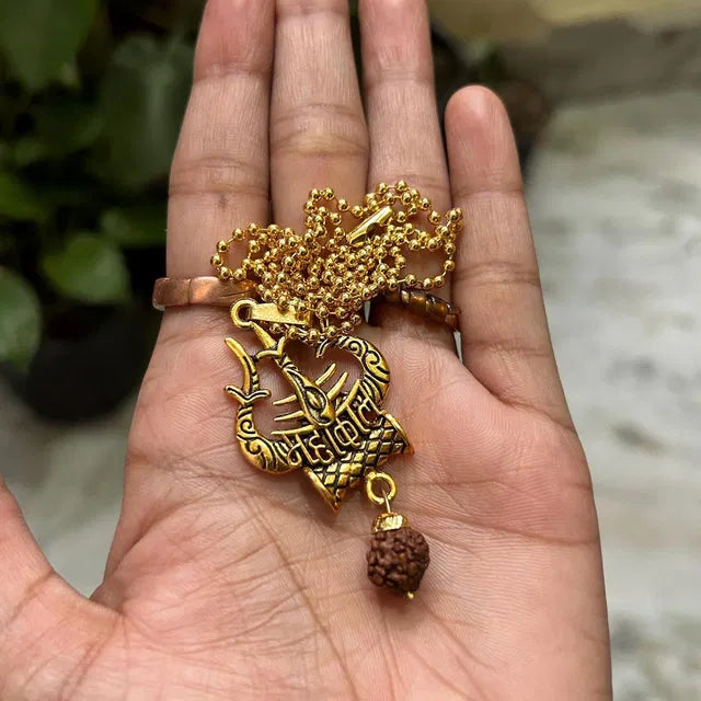 Spiritual Shiva Trishul Damru necklace with sacred symbols, designed for pooja articles, featuring intricate craftsmanship.