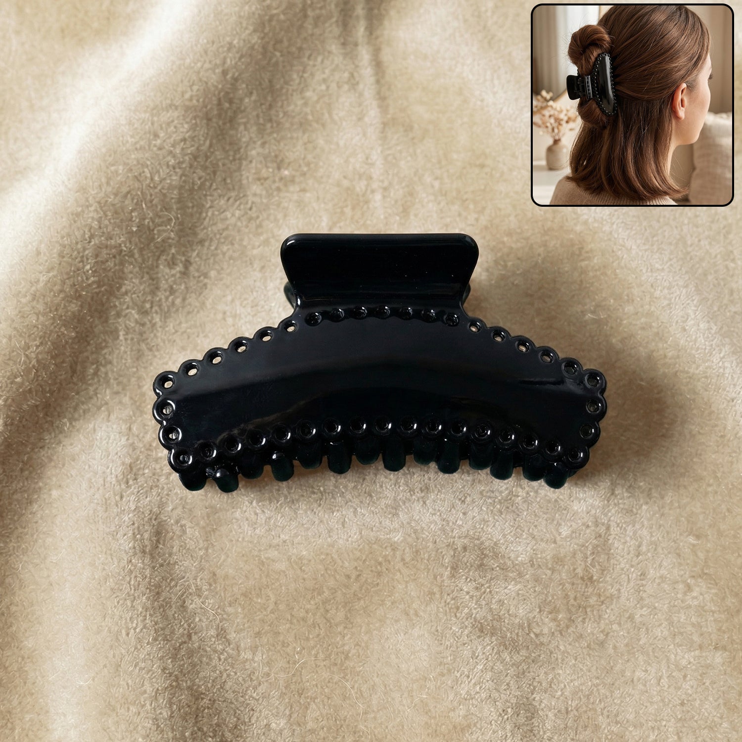 Black hair claw clip by Wukusy, stylish and elegant, holding hair securely with a sleek design, perfect for everyday use.