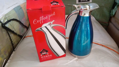 Stainless steel vacuum insulated kettle jug by Wukusy, 2L thermo flask for hot beverages like tea, coffee, and milk at home or travel.