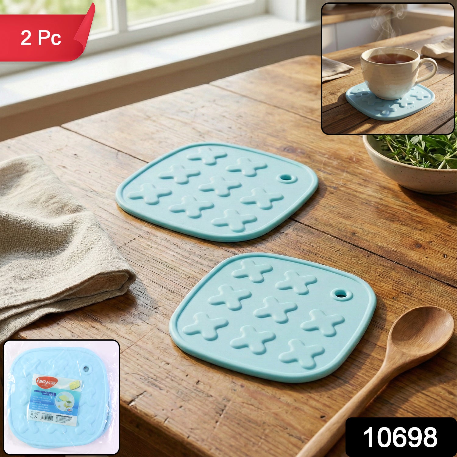 Wukusy heat resistant multipurpose cup coaster and hot pot pad set with two black silicone pads on a wooden table.