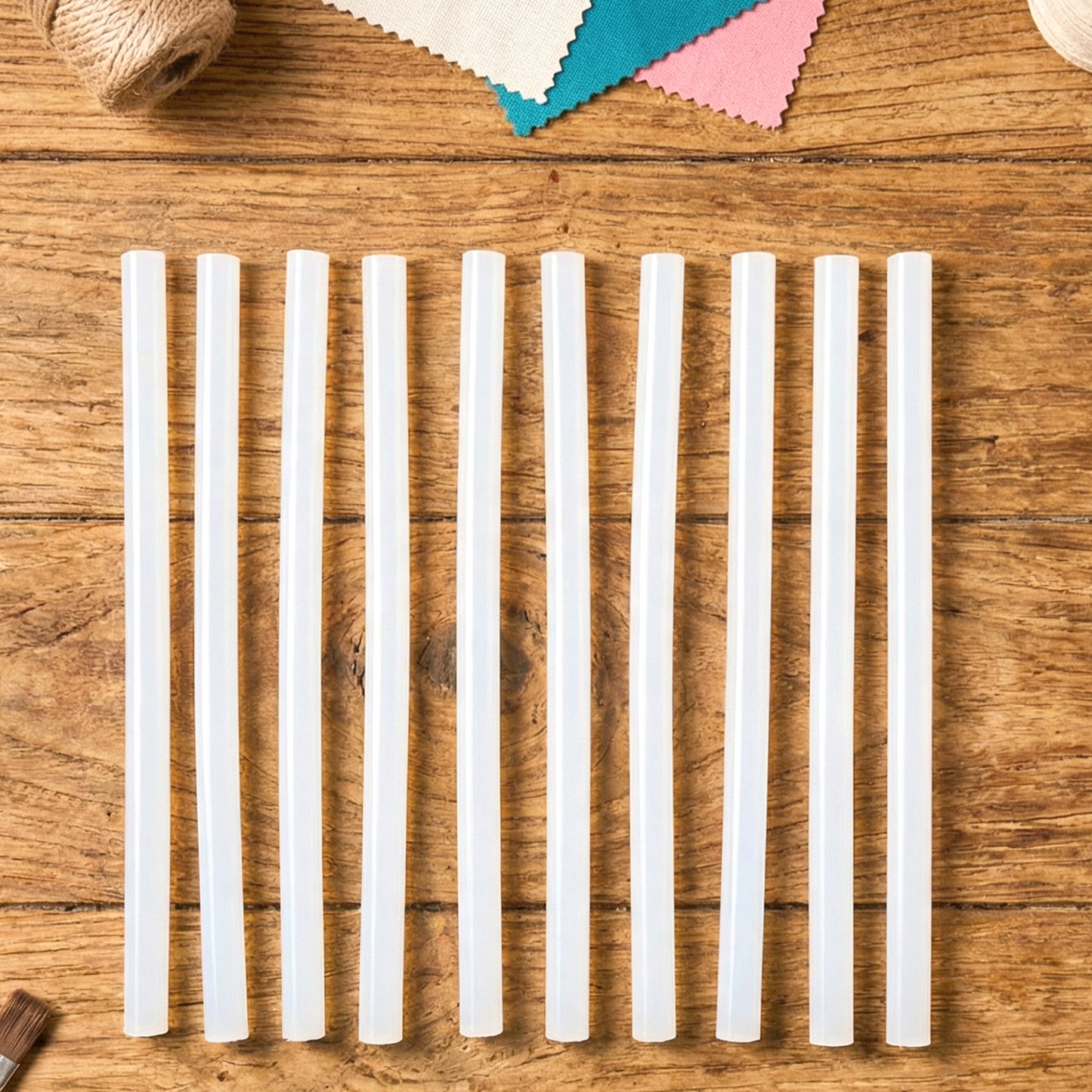 Wukusy hot glue stick set with 10 strong 20 cm adhesive glue sticks for crafts, shown in a close-up image.