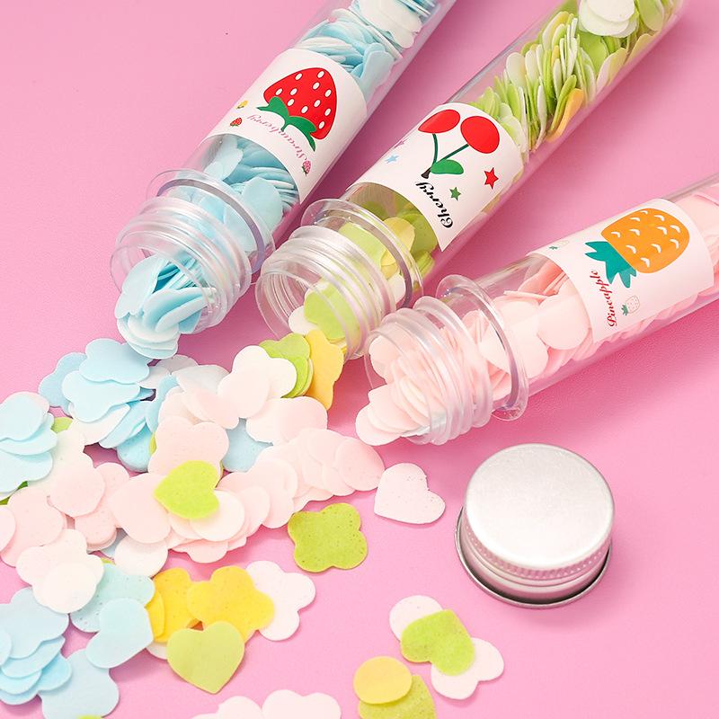 Wukusy 1319 portable hand washing bath with flower-shaped paper soap strips in test tube bottle, ideal for home hygiene.