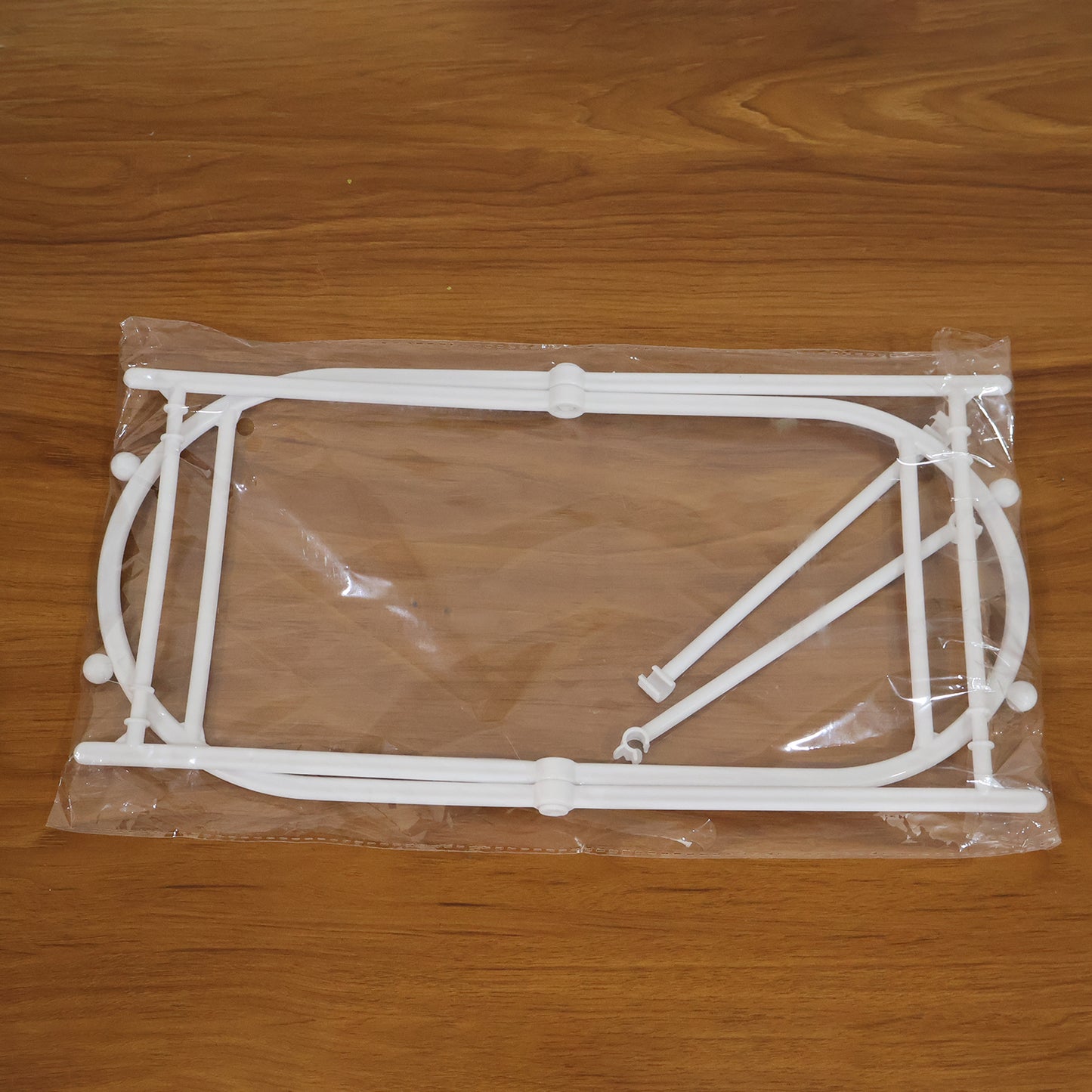 Wukusy foldable garbage bag holder stand with a sleek, compact design suitable for organizing trash bags at home or in the kitchen.