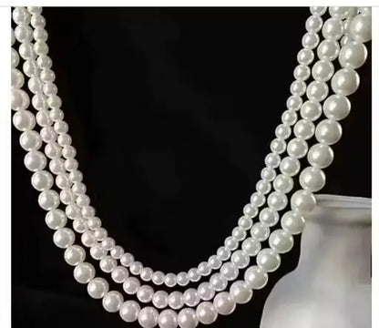 Elegant off-white pearl necklace with multiple layers by Ekom, perfect for women's fashion jewelry.