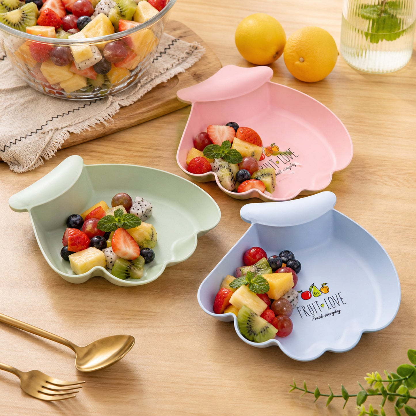 Colorful kids serving tray by Wukusy showing a lightweight plastic tray with multiple sections, designed for children's use.