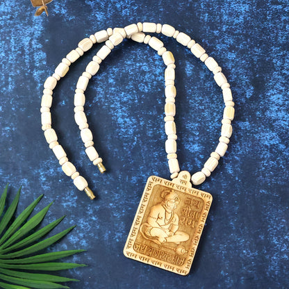 Wooden Hanuman pendant mala from Wukusy showing intricately carved wooden beads and a detailed Hanuman figure pendant.