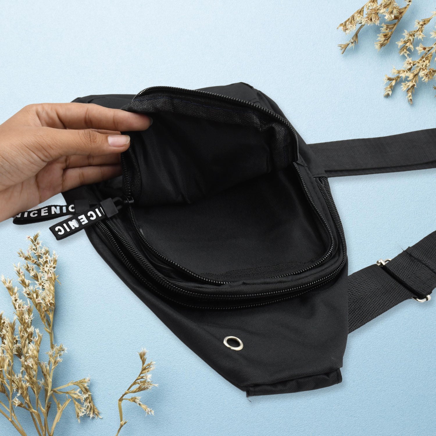 Wukusy waterproof anti-theft cross-body waist bag with USB charging port, earphone hook, casual travel design for men.