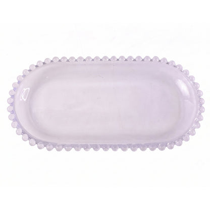Wukusy 9-inch oval transparent glass serving tray with beaded edge, ideal for snacks and appetizers.