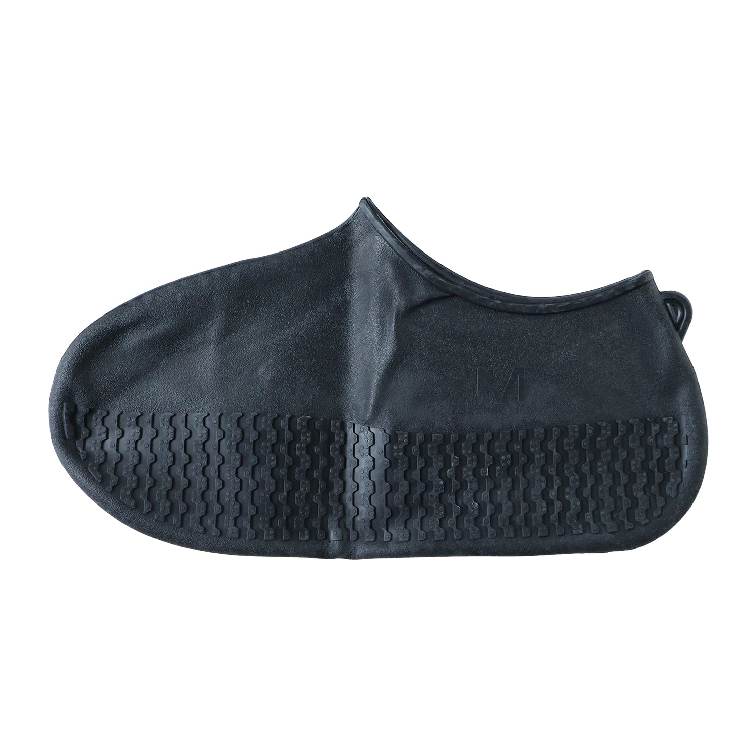 Pair of black waterproof silicone shoe covers by Wukusy, medium size, shown on a shoes in a natural outdoor setting