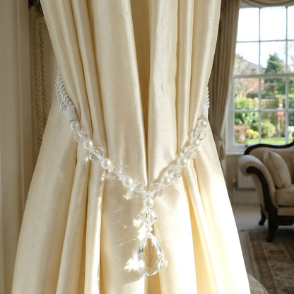 Luxury crystal and pearl beaded curtain tieback by Wukusy, featuring elegant clear crystals and pearls for decorative window accents.