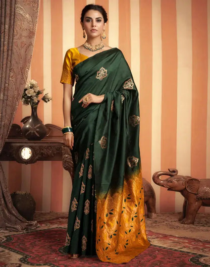 Elegant green silk saree from Ekom's Royal Green Golden Elegance Collection, featuring intricate golden border details.