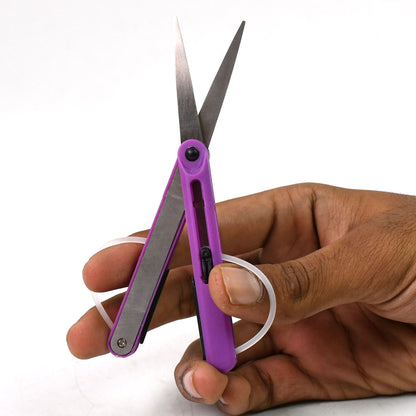 Wukusy Pen Cut compact scissors in pen style, portable travel scissors for home improvement, shown in a sleek pen design.