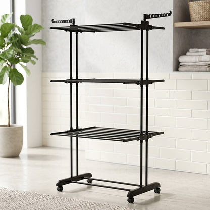 Wukusy metal expandable garment rack with 3 layers, cloth drying stand on wheels, designed for drying and organizing clothes.