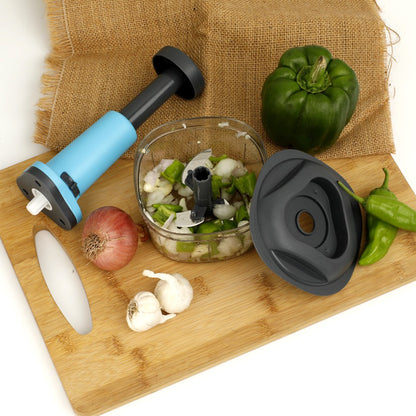 Wukusy 5902 manual push food chopper with three stainless steel blades for vegetables and kitchen prep.