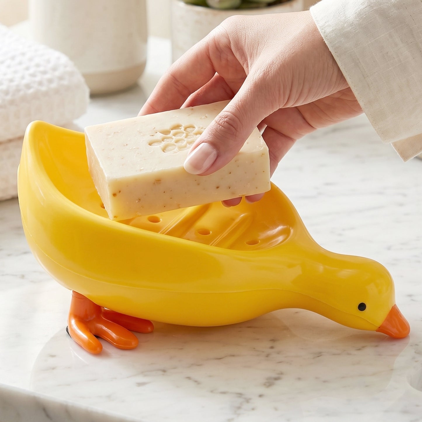 Cute duck-shaped plastic soap holder box for bathroom, featuring a kid-friendly soap dish tray with Wukusy branding.
