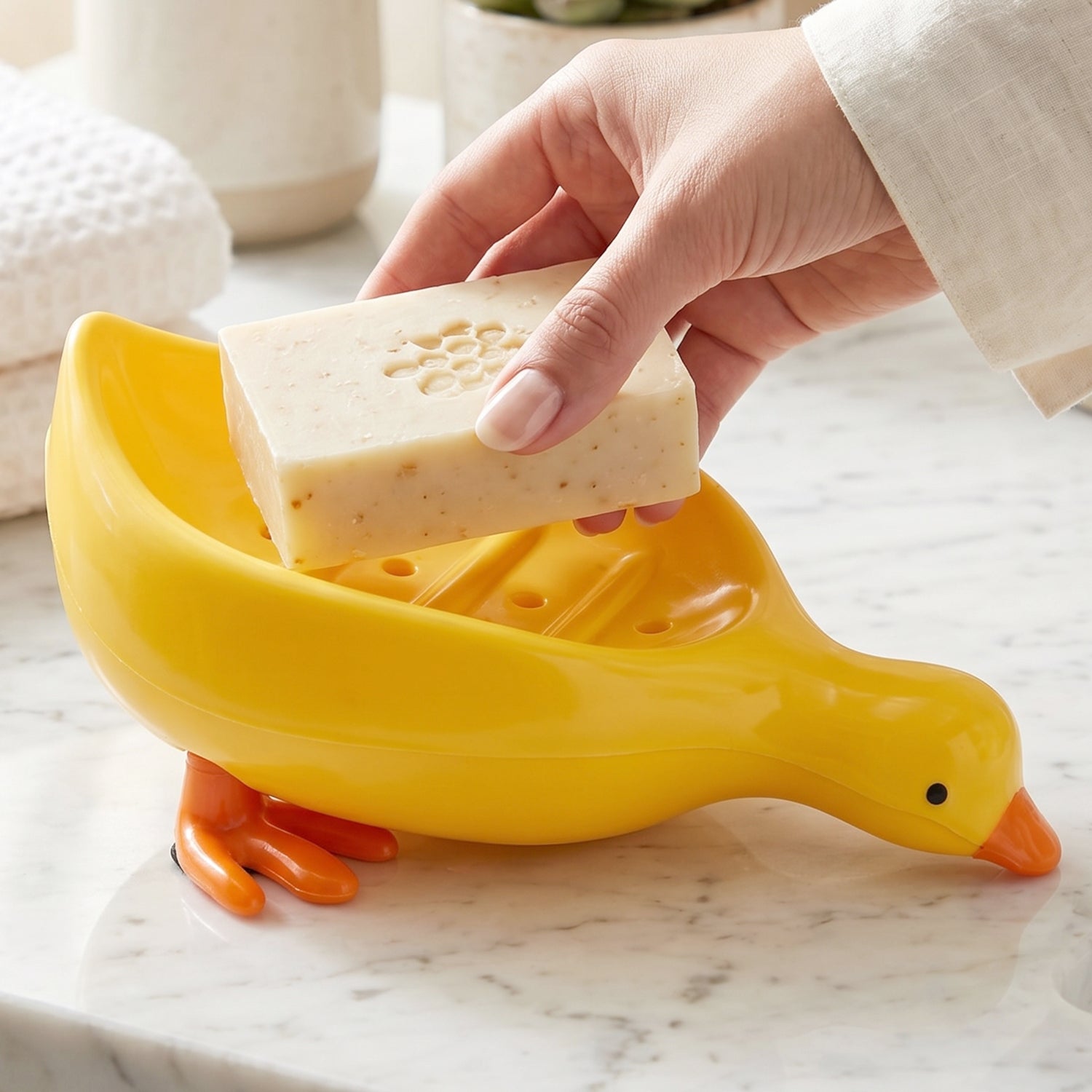 Cute duck-shaped plastic soap holder box for bathroom, featuring a kid-friendly soap dish tray with Wukusy branding.