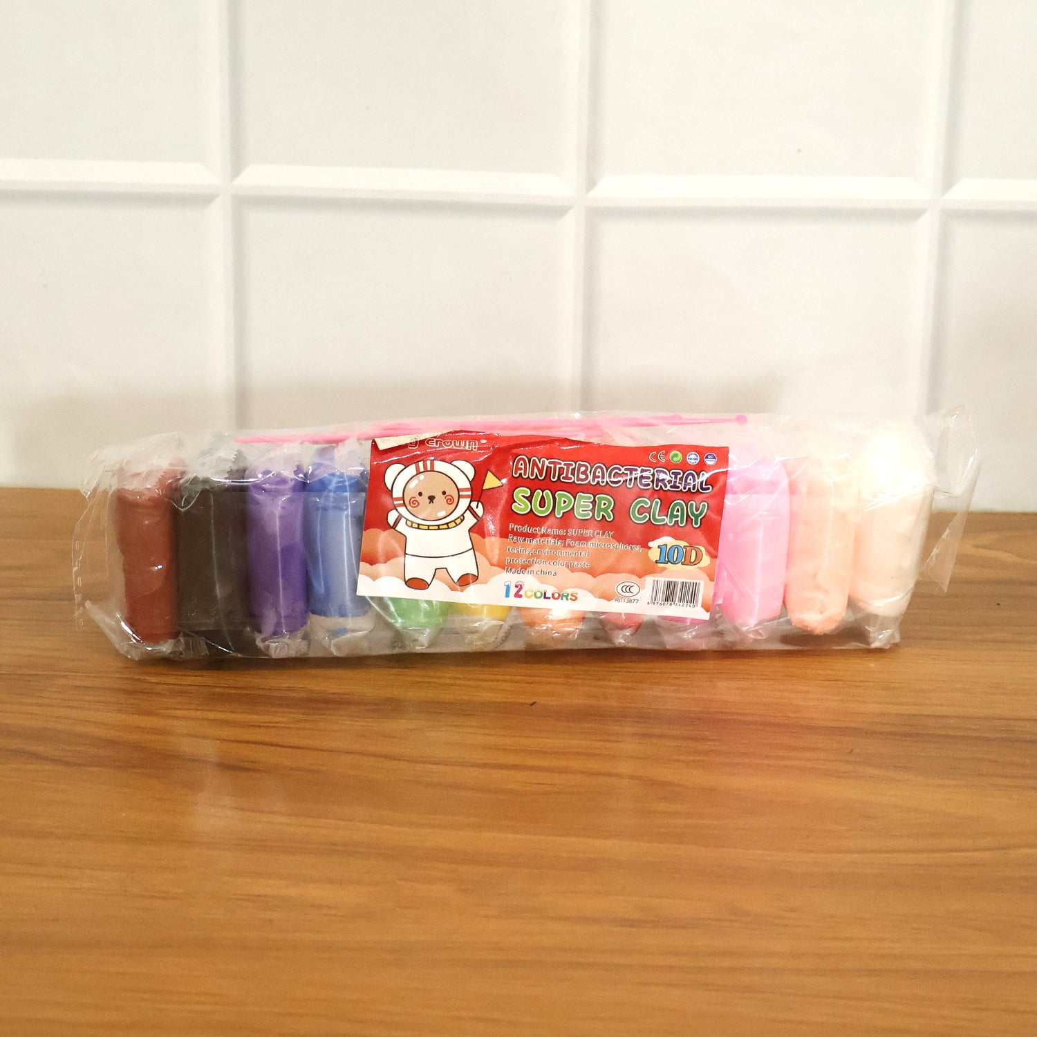 Kids Wukusy 12-color antibacterial super clay set for creative play, showing vibrant clay pieces in a colorful set.