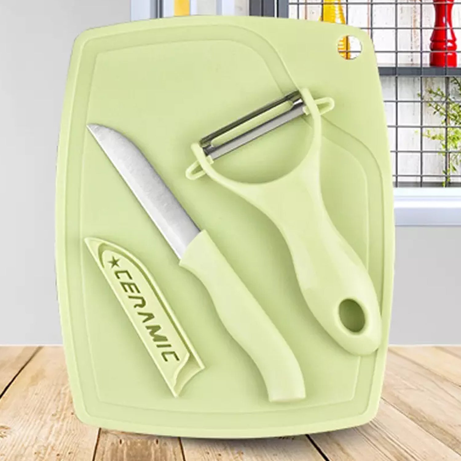 Green plastic kitchen peeler and stainless steel 3-piece knife set from Wukusy for home and kitchen use.