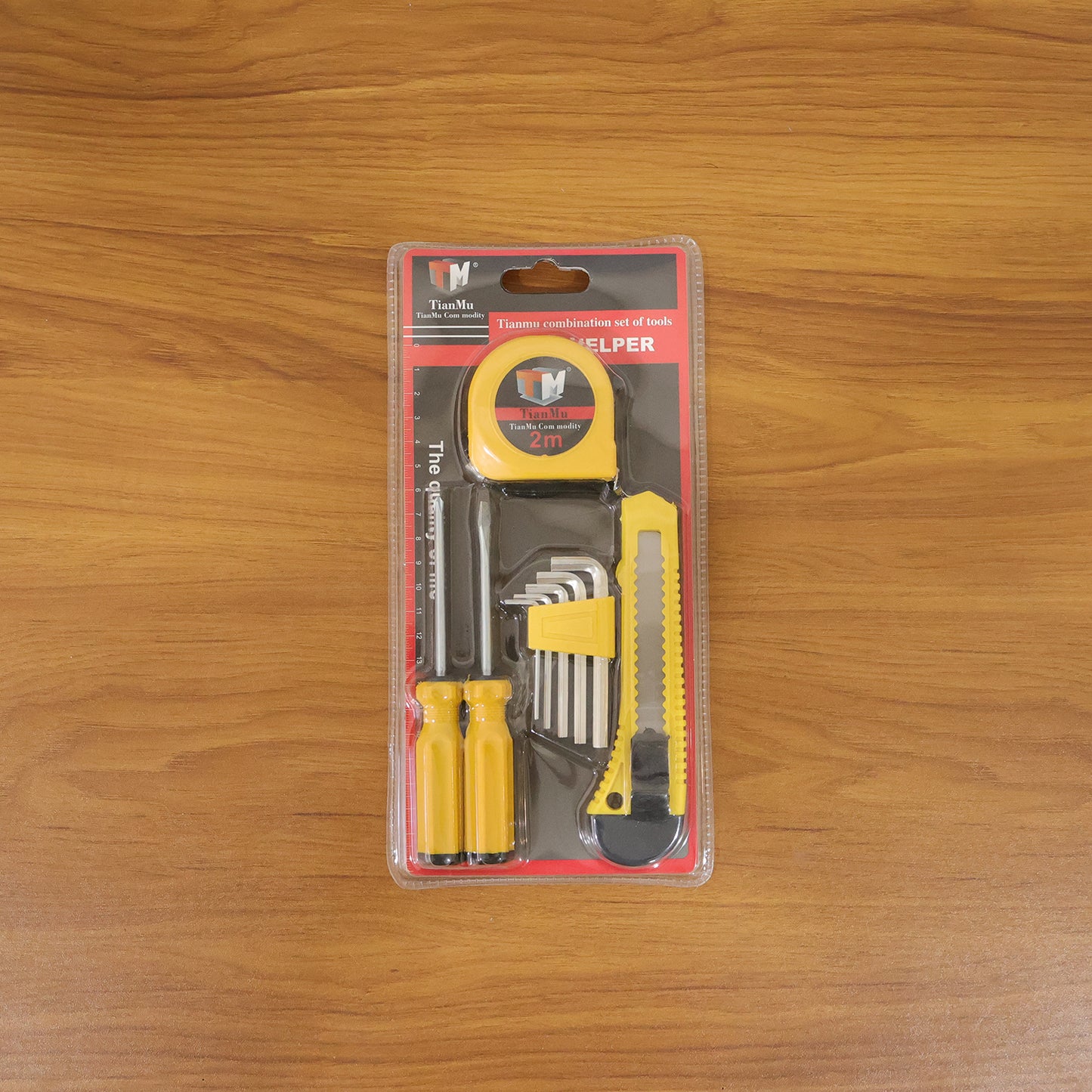 Wukusy Compact Tianmu 9-piece combination tool set with screwdrivers, pliers, and wrenches displayed on a white background.