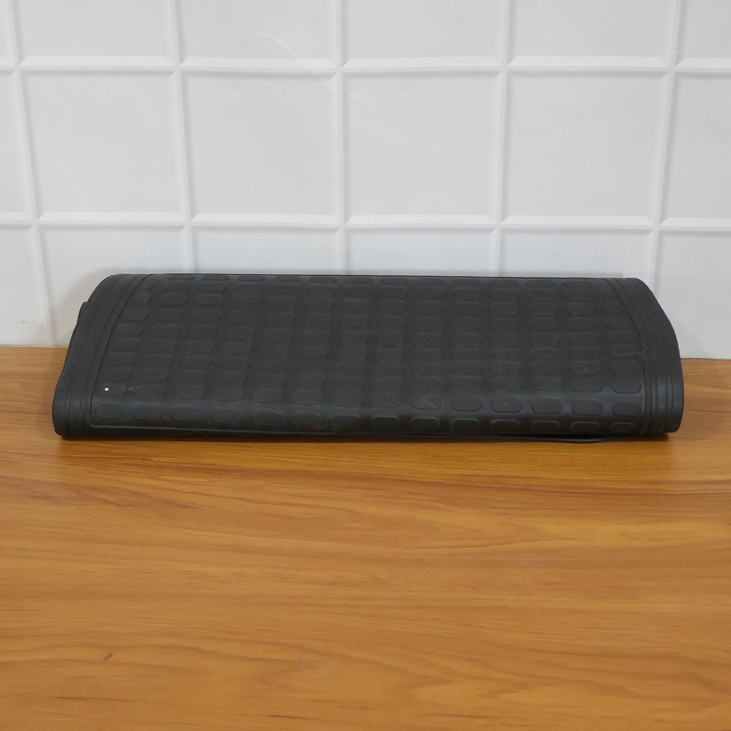 Set of four heavy duty car floor mats by Wukusy, durable rubber mats with textured surface for vehicle interior protection.