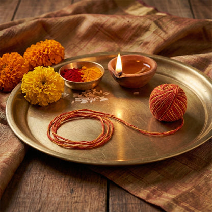 Sacred cotton Pooja Kalawa Moli thread by Wukusy, 1 piece, showing the delicate, traditional thread used in religious ceremonies