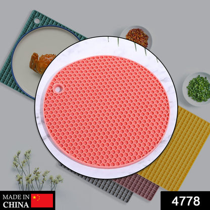 Wukusy silicone hot mat for breakfast, lunch, and dinner, used as a heat-resistant placemat for various dining settings.