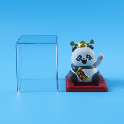 Solar powered moving hand panda showpiece by Wukusy, featuring a cute panda with animated hand movements, ideal for decorative display.