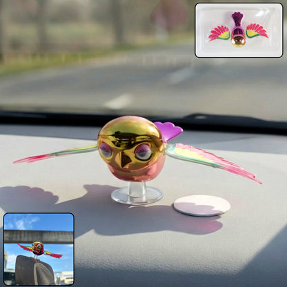 Wukusy wind flying bird dashboard decoration featuring a metallic bird figure perched on a sleek base.