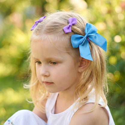 Set of three Wukusy elegant satin ribbon bow hair clips with soft, shiny bows for stylish hair accessories.