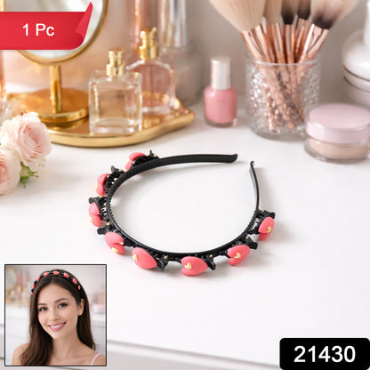 Wukusy cute heart design decorative hairband for women and girls, featuring a playful heart pattern in bright colors.