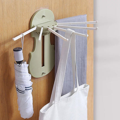 Wukusy 7728 plastic 7-in-1 retractable wall-mounted pull-out hanger rack with hooks for kitchen or bathroom storage.
