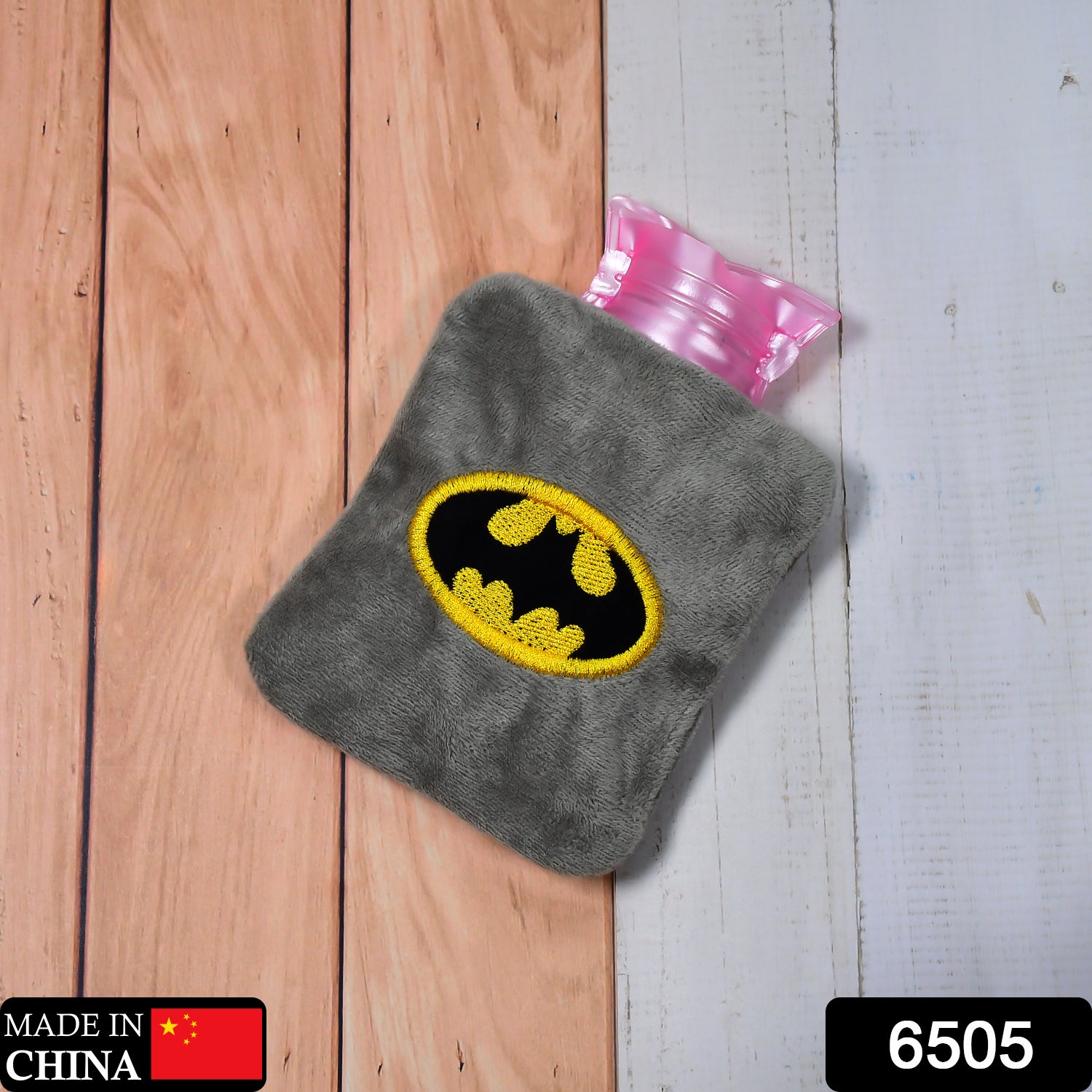 Wukusy 6505 Batman hot water bag with cover for pain relief, neck, shoulder, hand, feet warmth, and menstrual cramps.