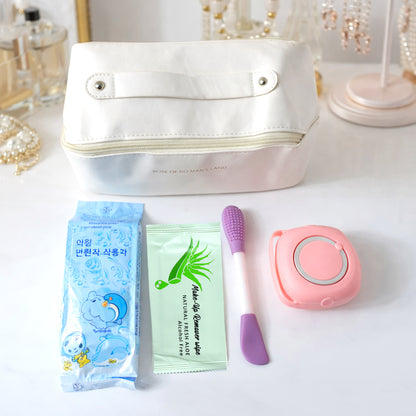 Wukusy premium women travel hygiene essentials set with shampoo, conditioner, body wash, and skincare products in travel-sized bottles.