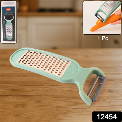 Wukusy Apex 2-in-1 vegetable grater and peeler combo tool with stainless steel blades for kitchen prep.
