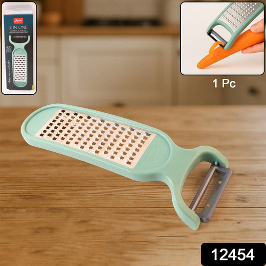 Wukusy Apex 2-in-1 vegetable grater and peeler combo tool with stainless steel blades for kitchen prep.